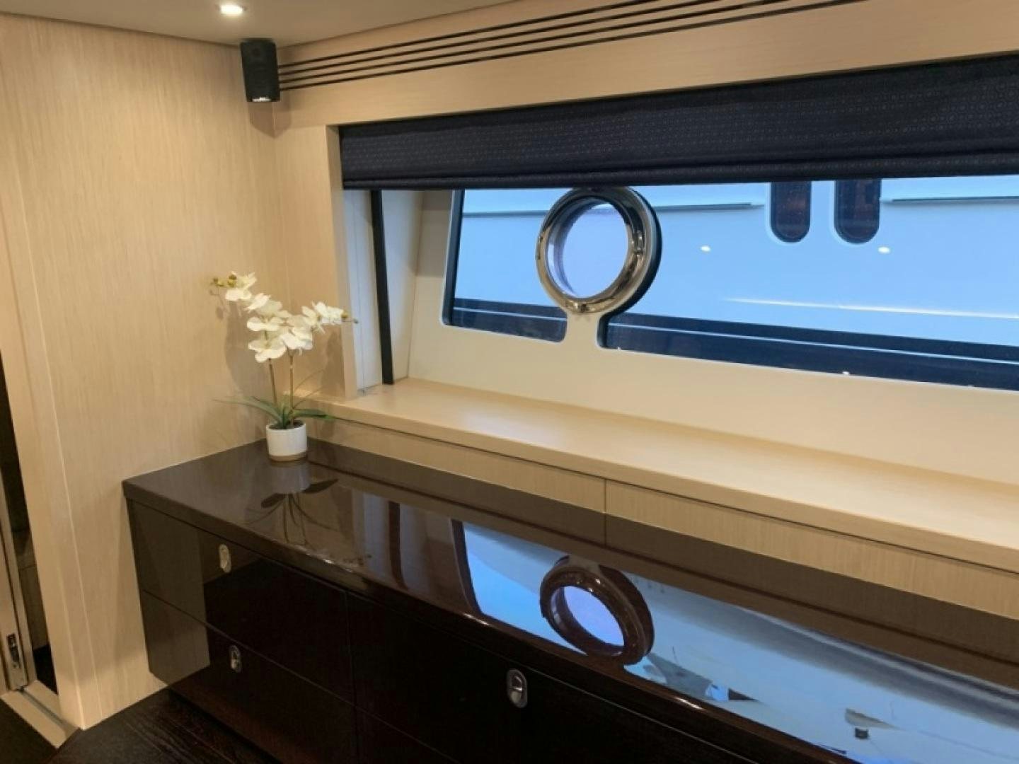 a bathroom with a large mirror aboard NBLUE Yacht for Sale