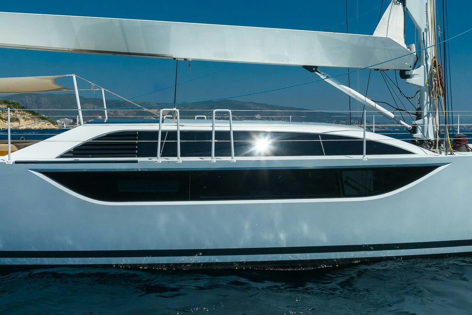 a white boat on the water aboard BLISS II Yacht for Sale