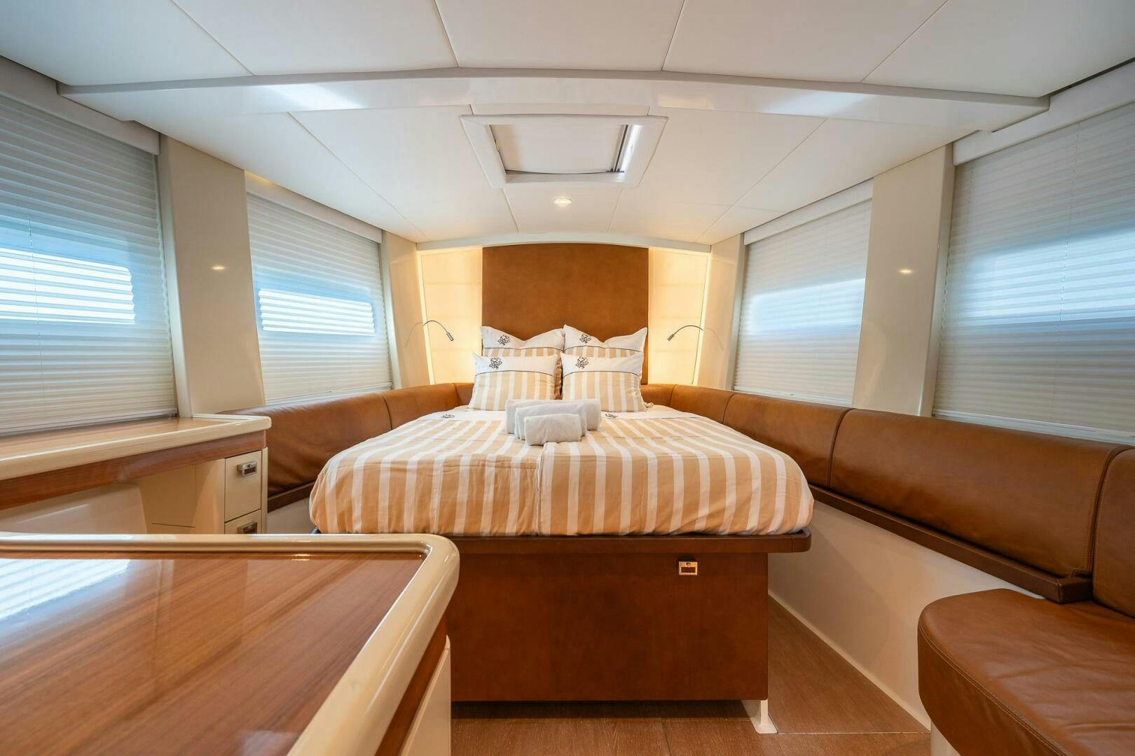 a room with a bed and a window aboard BLISS II Yacht for Sale