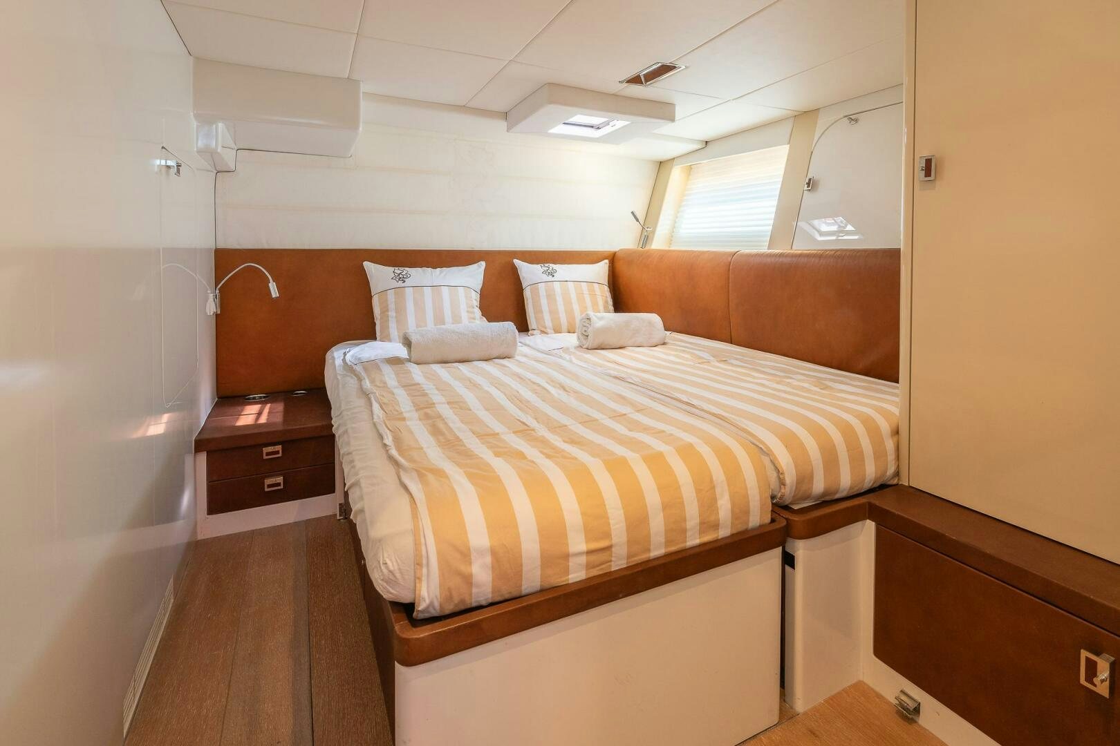 a bed in a room aboard BLISS II Yacht for Sale