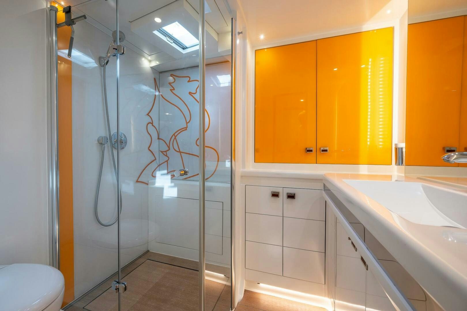 a bathroom with a shower and sink aboard BLISS II Yacht for Sale