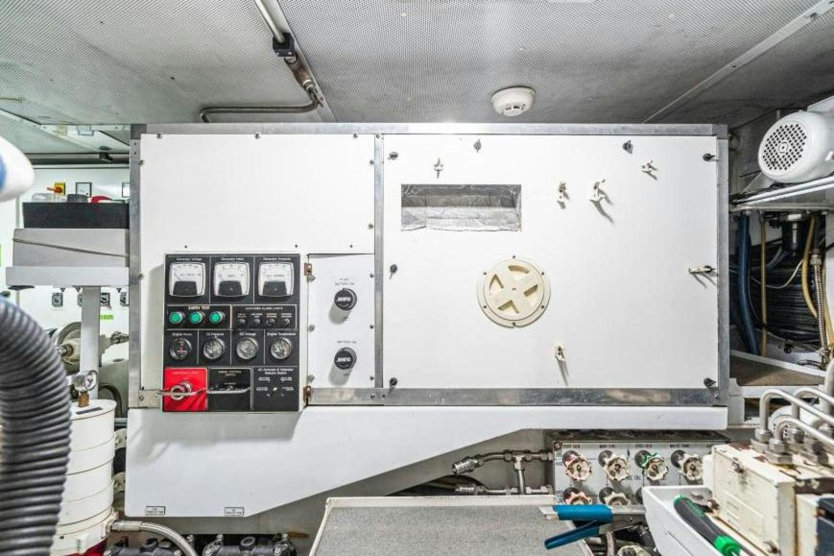 a white machine with a green light aboard PALIADOR Yacht for Sale