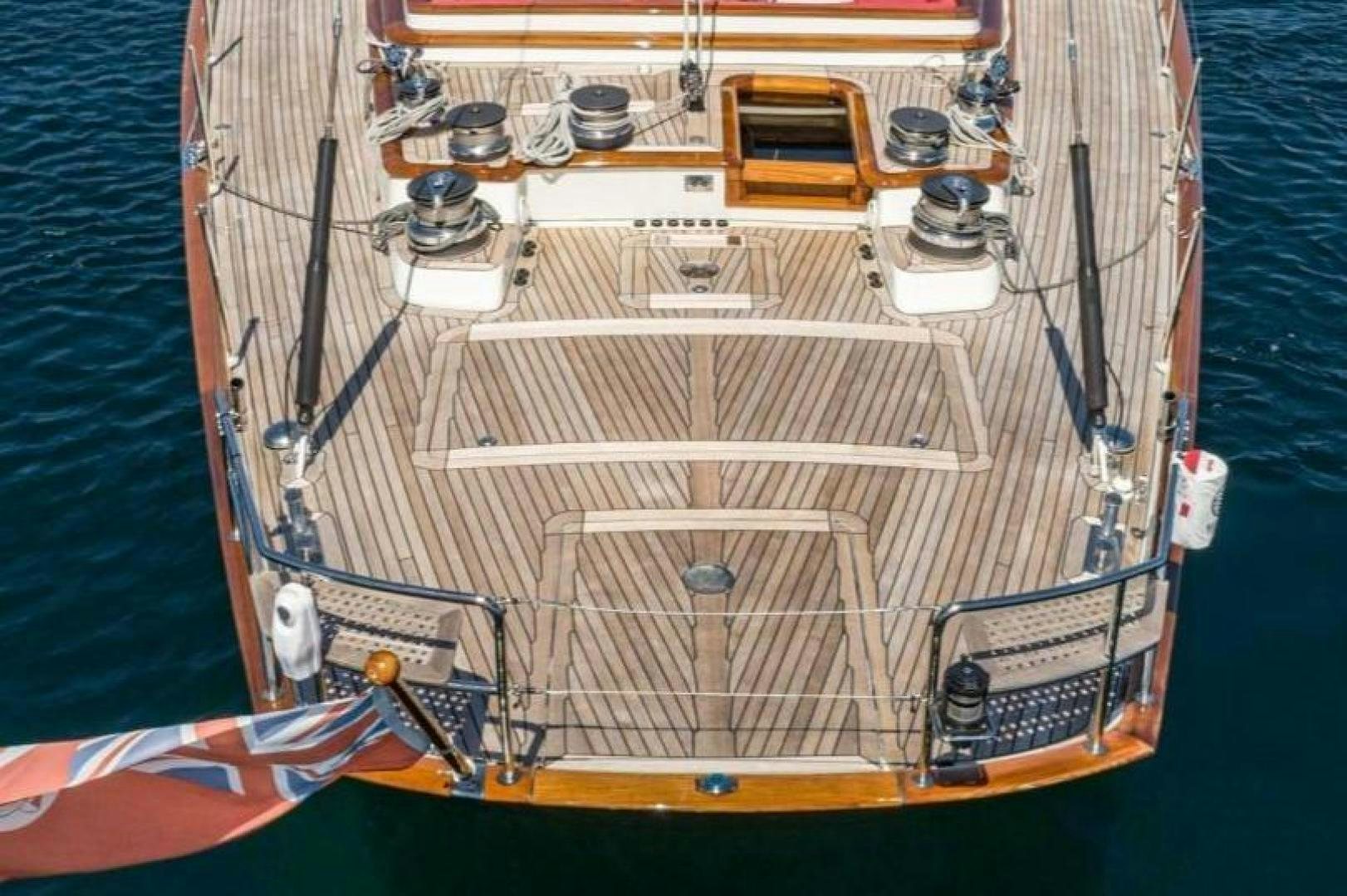 a boat with a large white sail aboard PALIADOR Yacht for Sale
