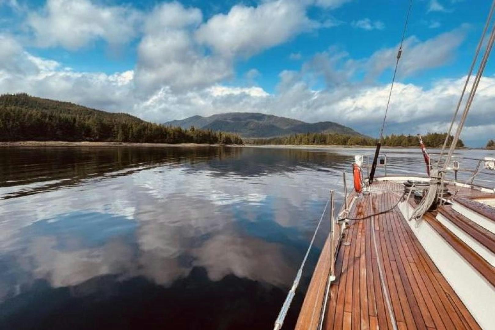 a wooden dock over a body of water aboard PALIADOR Yacht for Sale