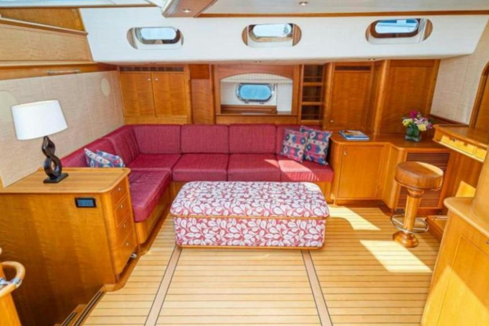a living room with a couch and a table aboard PALIADOR Yacht for Sale