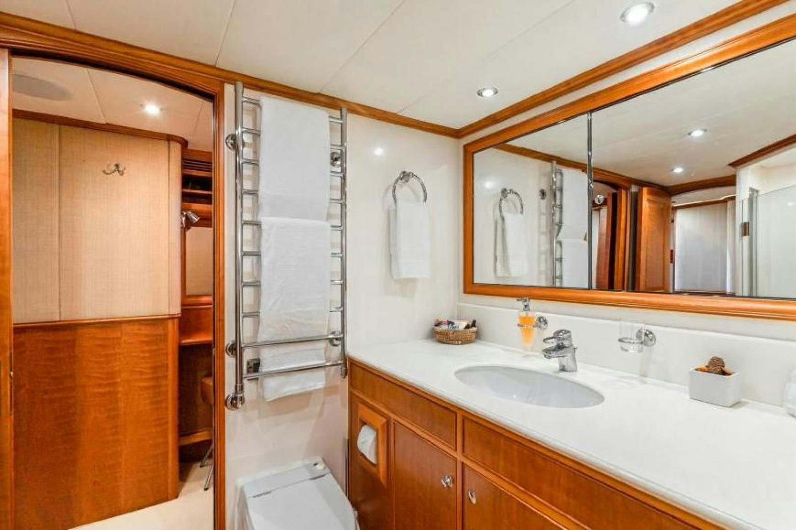 a bathroom with a glass shower unit aboard PALIADOR Yacht for Sale