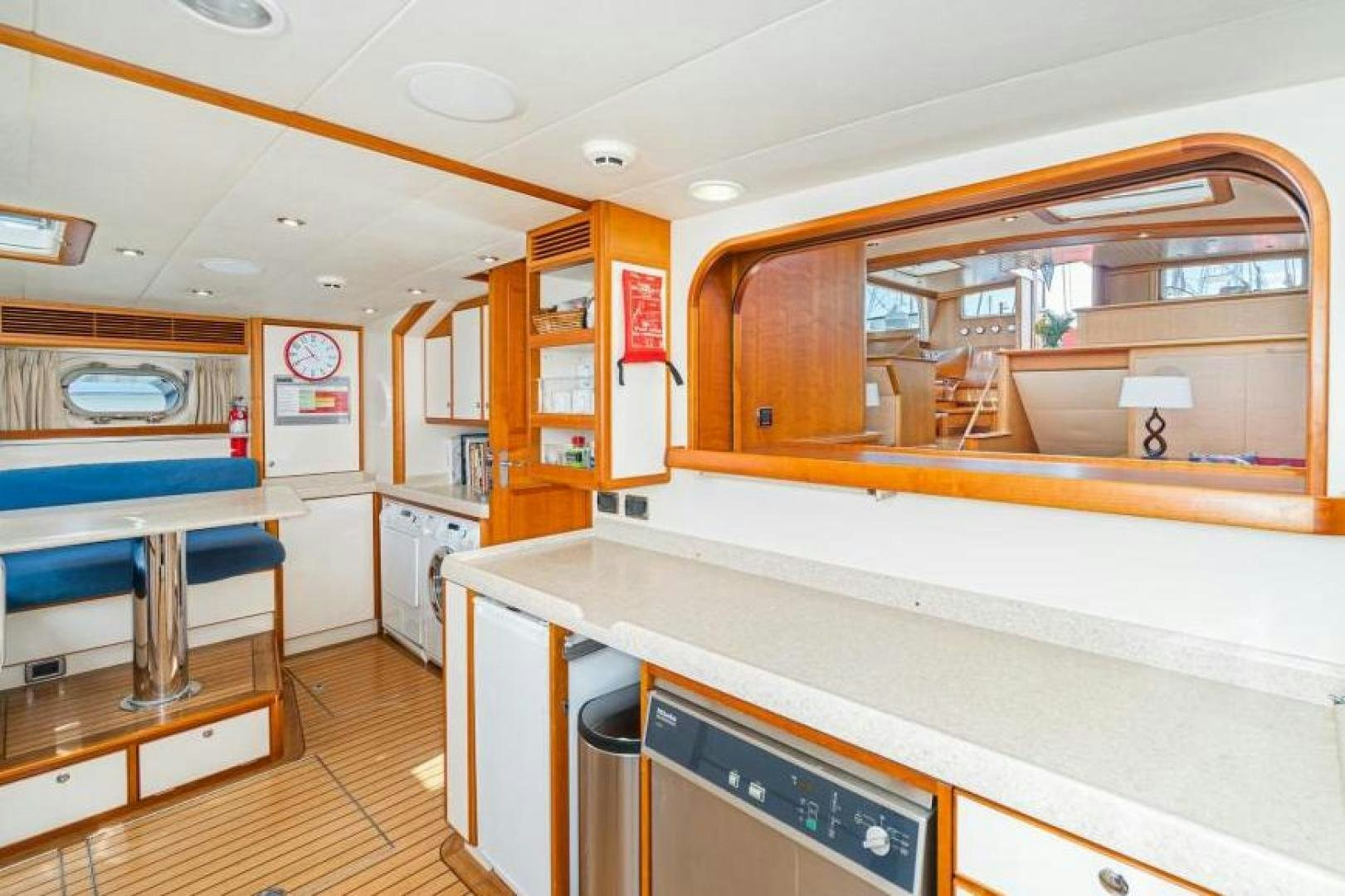 a kitchen with a large island aboard PALIADOR Yacht for Sale