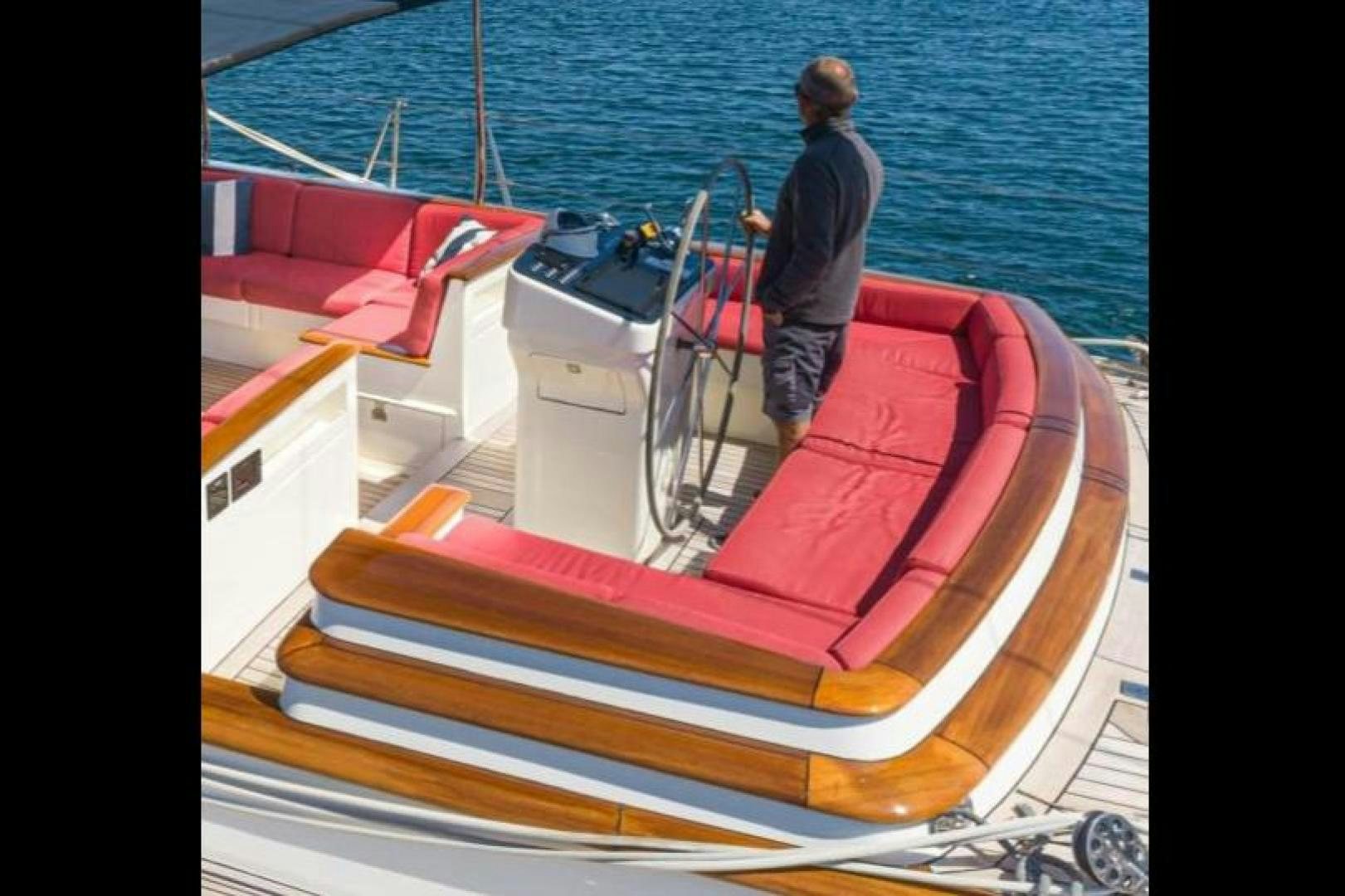 a person standing on a boat aboard PALIADOR Yacht for Sale