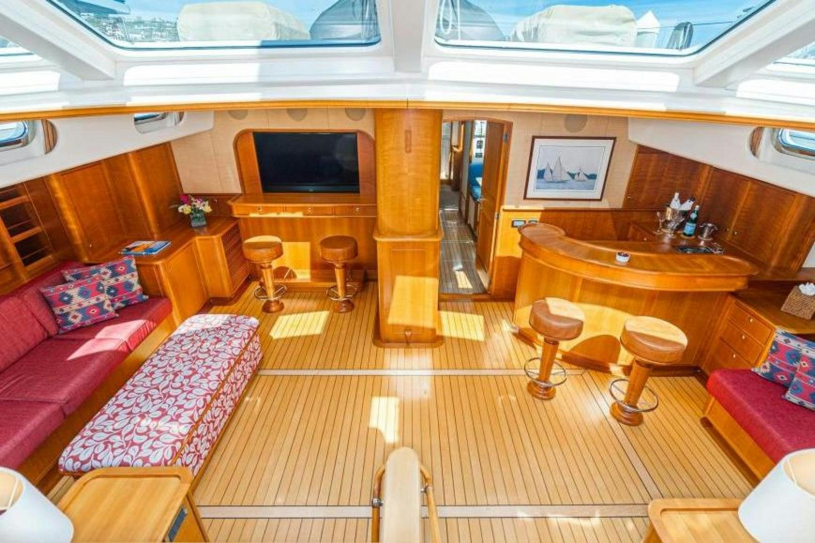 a room with a table and chairs aboard PALIADOR Yacht for Sale