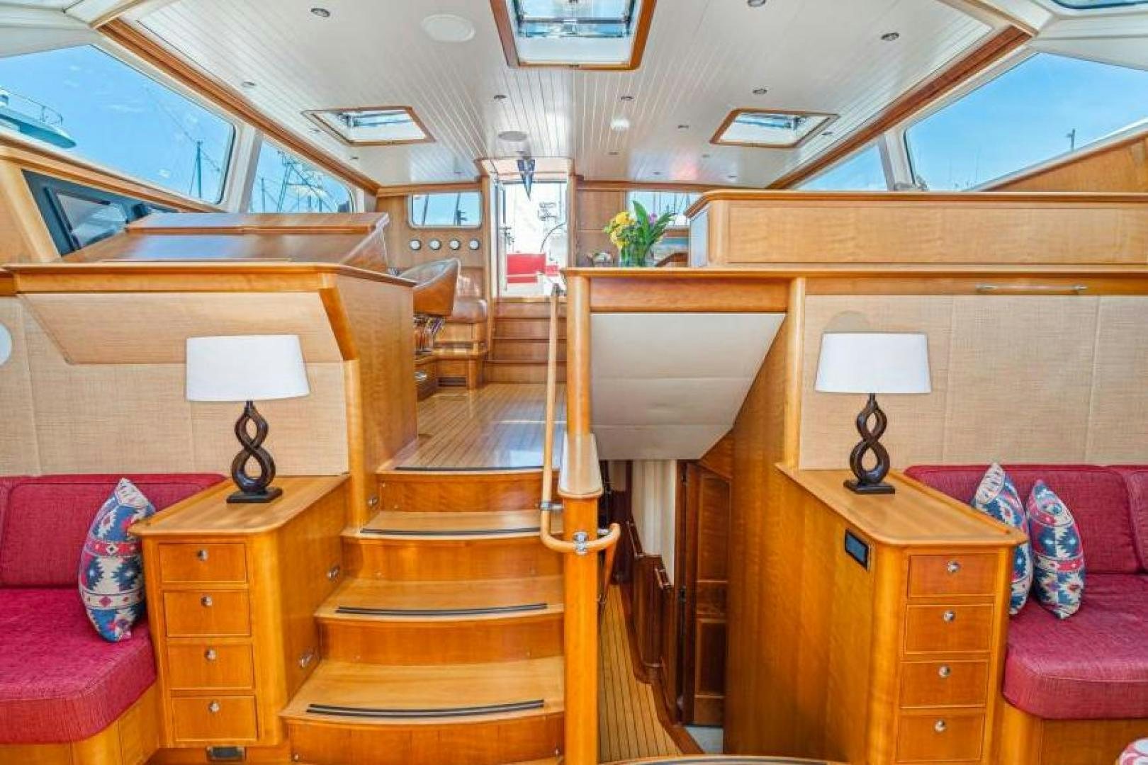 a cabin with a bed and a couch aboard PALIADOR Yacht for Sale