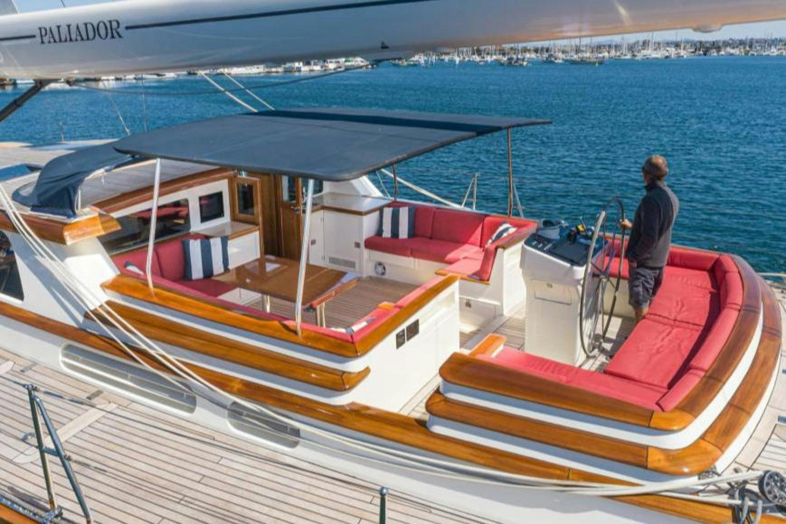 a person standing on a boat aboard PALIADOR Yacht for Sale