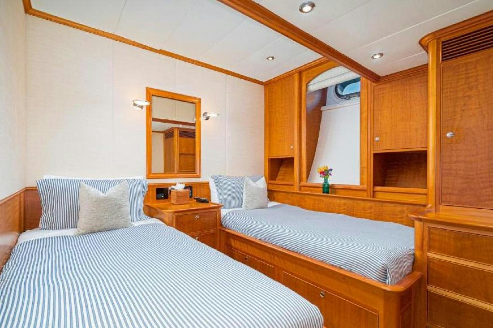 a couple of beds in a room aboard PALIADOR Yacht for Sale