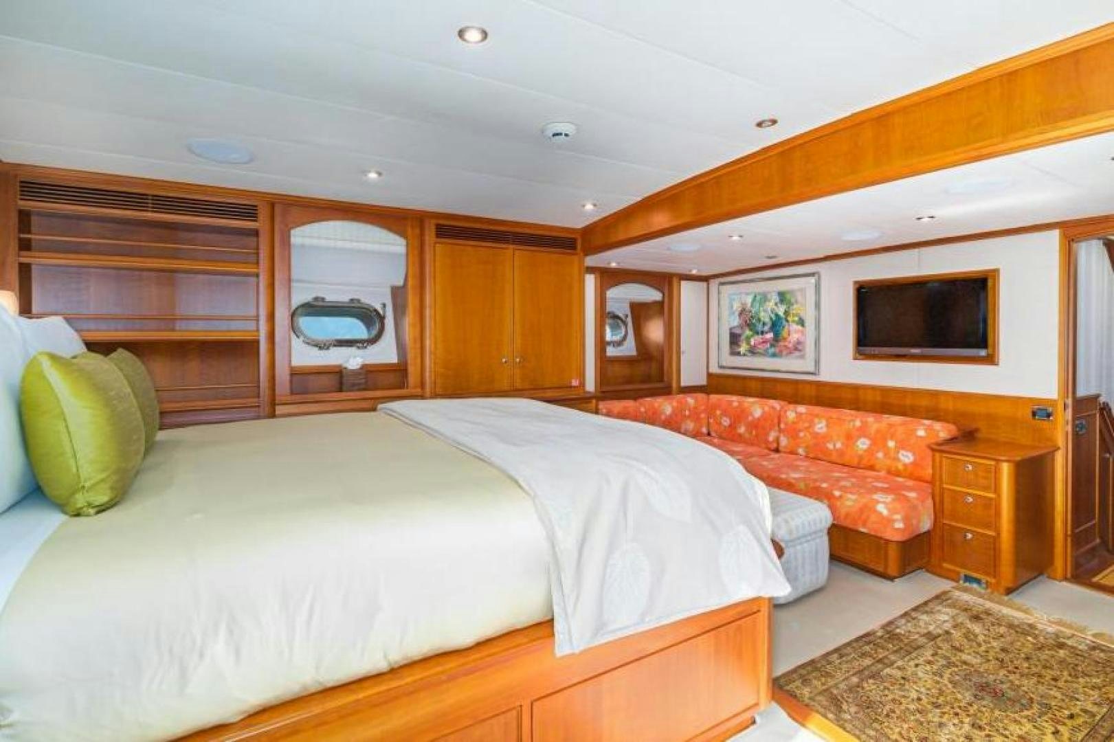 a bedroom with two beds aboard PALIADOR Yacht for Sale