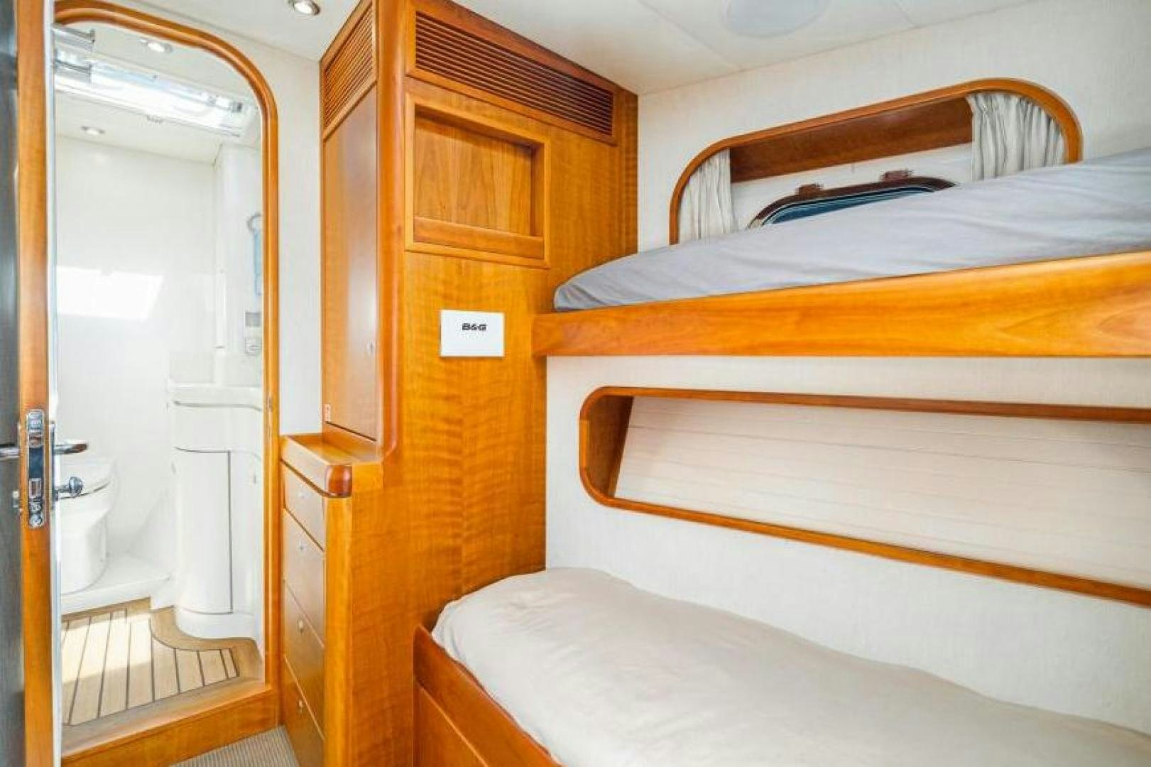 a room with a bed and a closet aboard PALIADOR Yacht for Sale