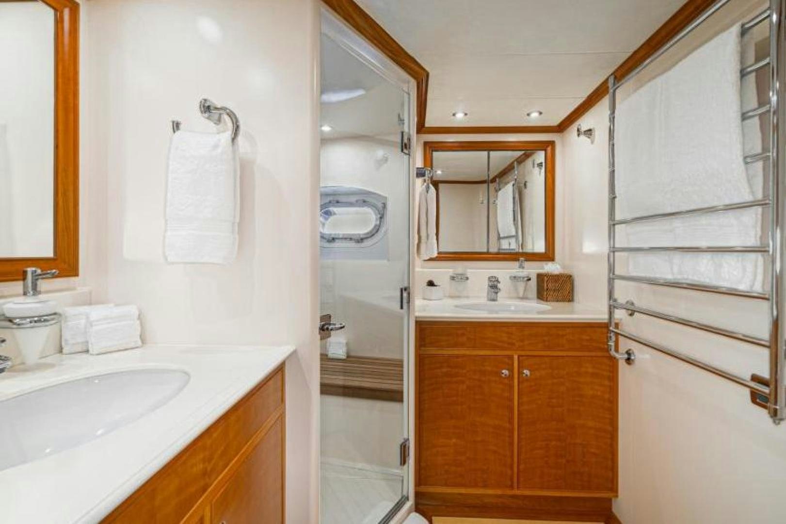 a bathroom with a sink and a shower aboard PALIADOR Yacht for Sale
