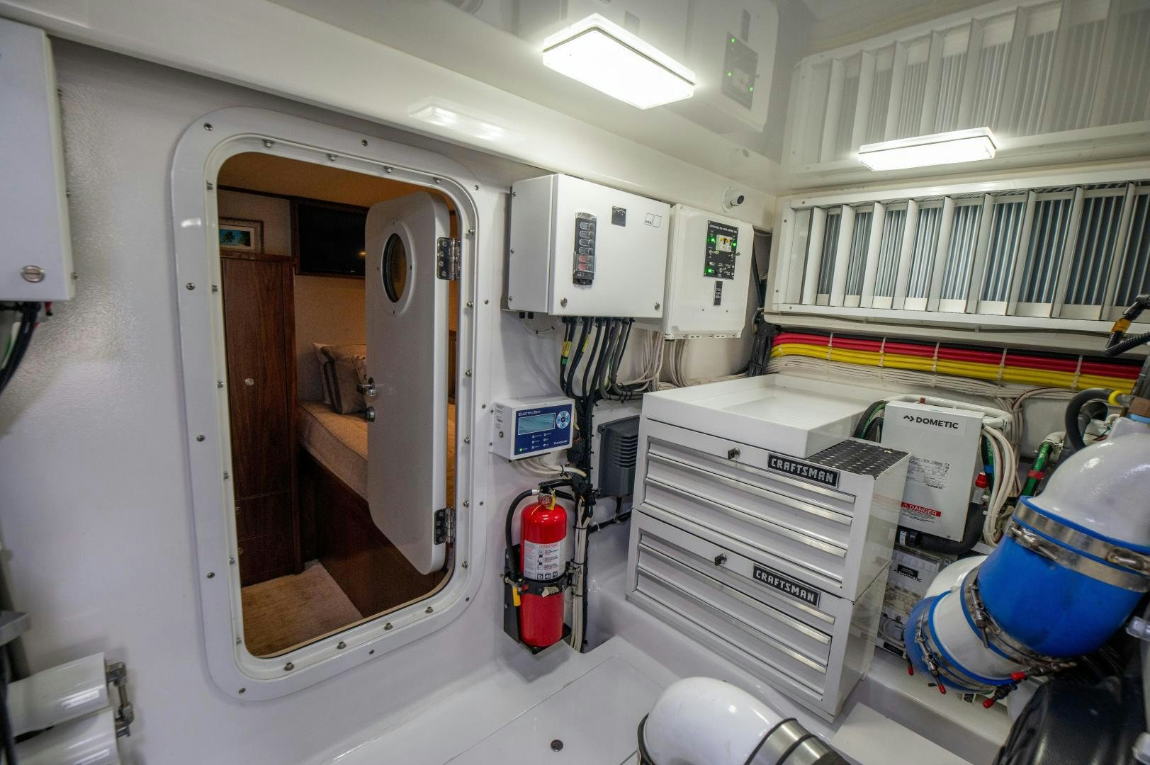 a medical room with a mirror aboard RAGIN CAJUN Yacht for Sale