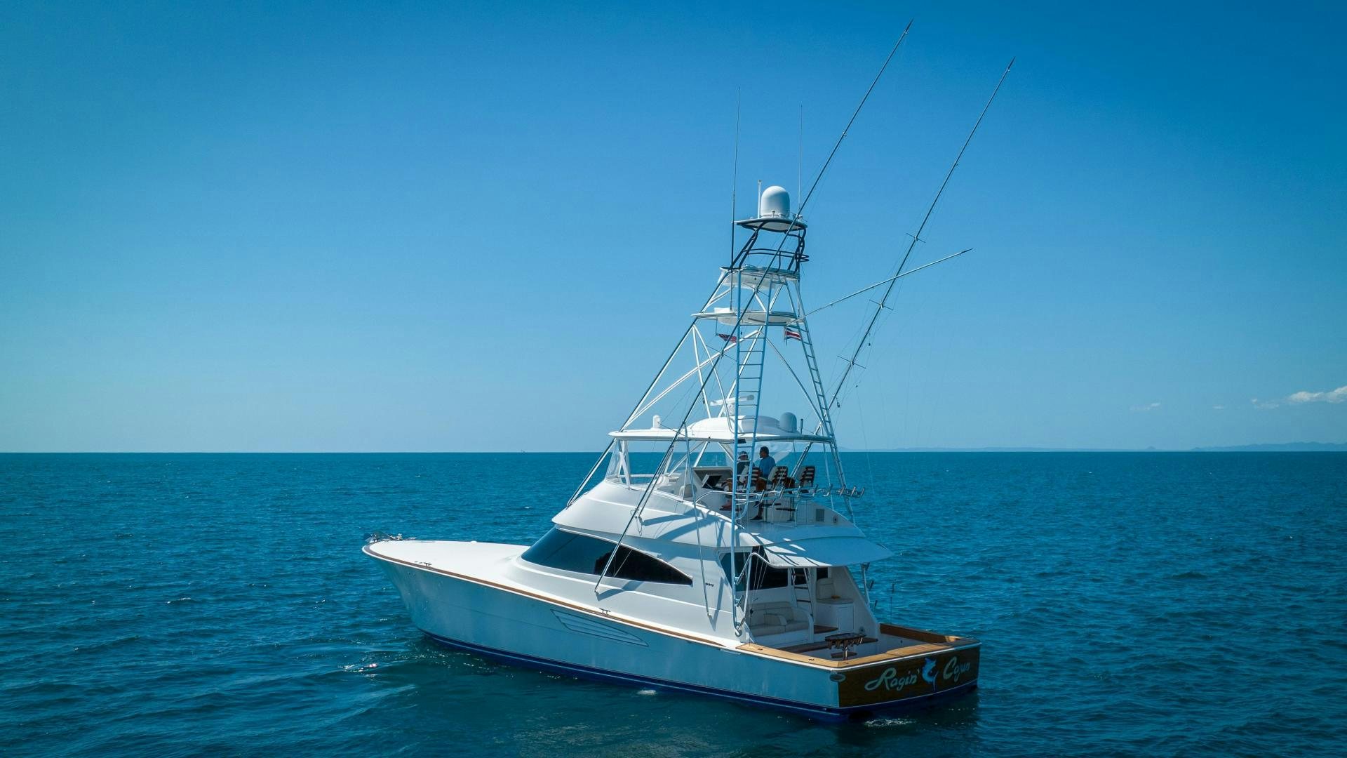 a boat in the water aboard RAGIN CAJUN Yacht for Sale