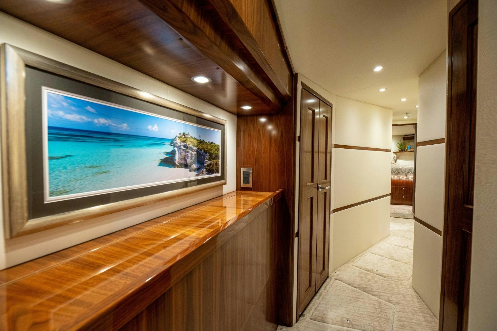 a room with a large screen aboard RAGIN CAJUN Yacht for Sale