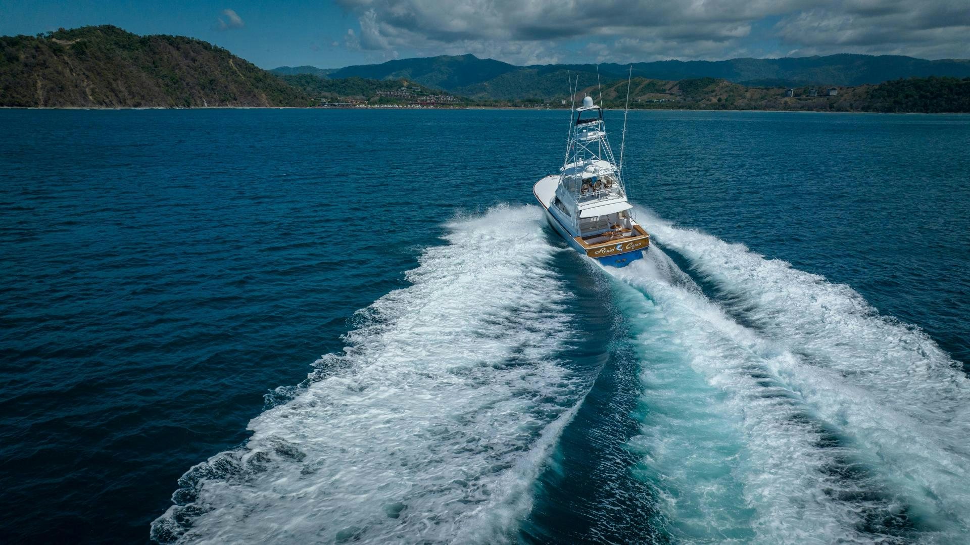 a boat on the water aboard RAGIN CAJUN Yacht for Sale