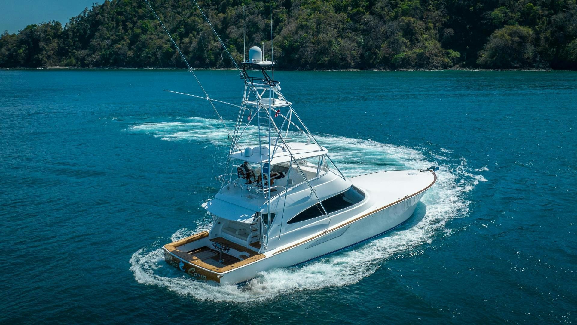 a boat on the water aboard RAGIN CAJUN Yacht for Sale