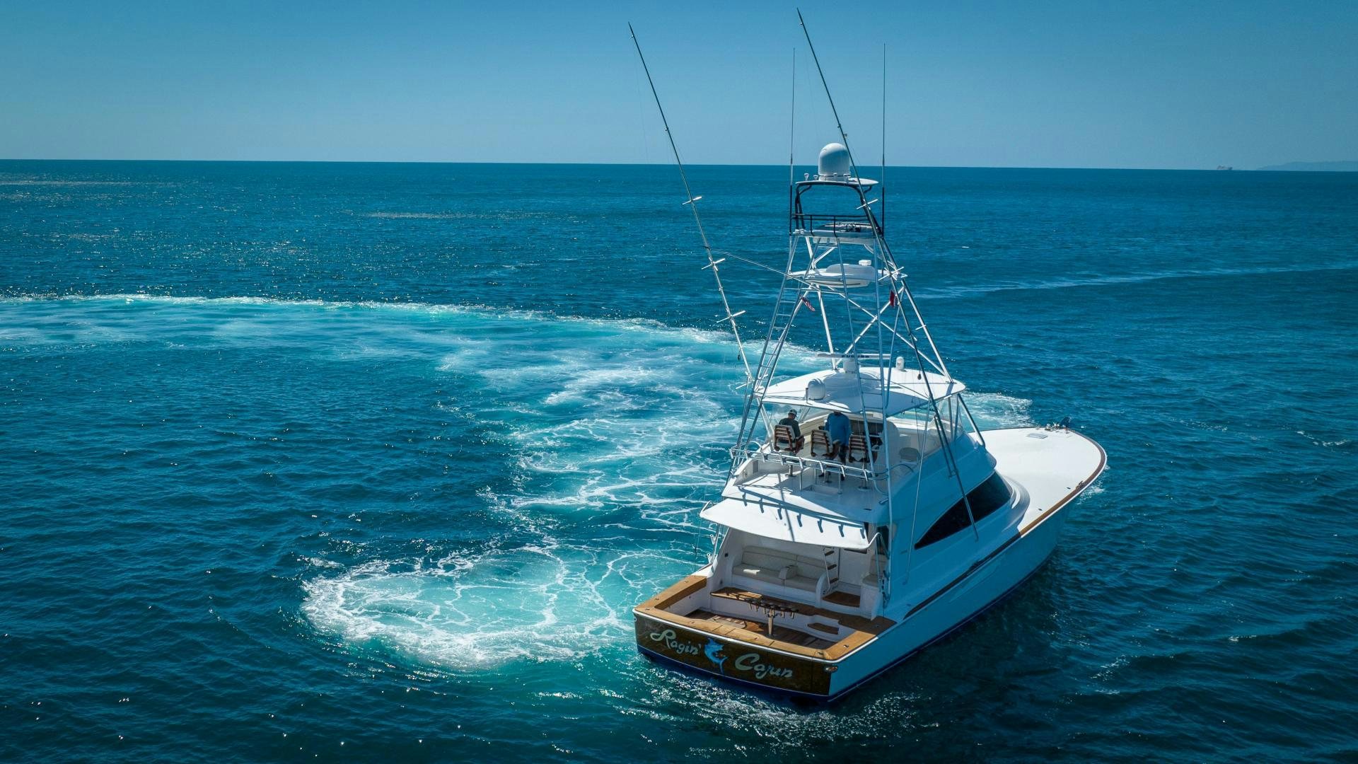a boat in the water aboard RAGIN CAJUN Yacht for Sale
