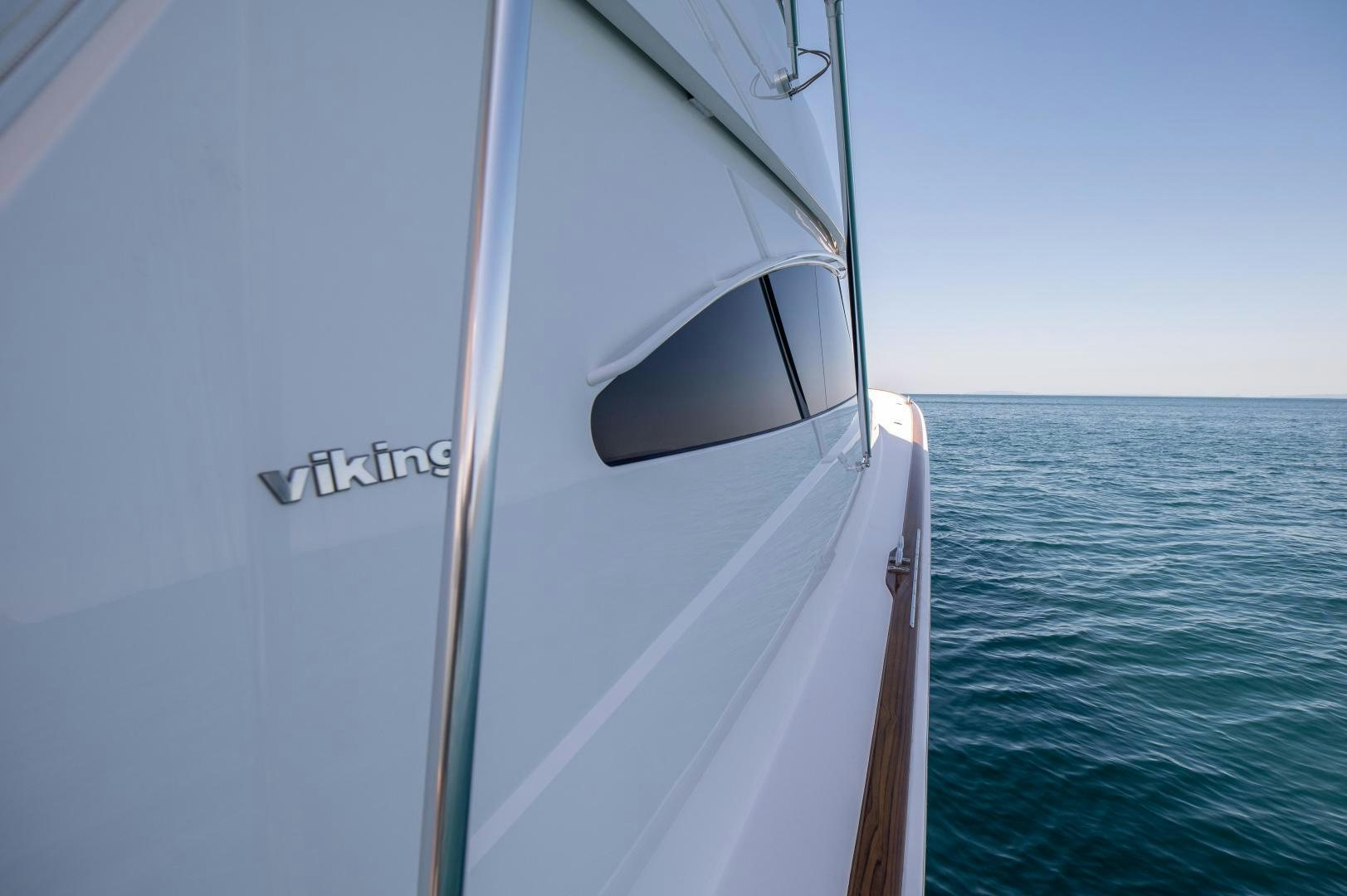 a white boat in the water aboard RAGIN CAJUN Yacht for Sale