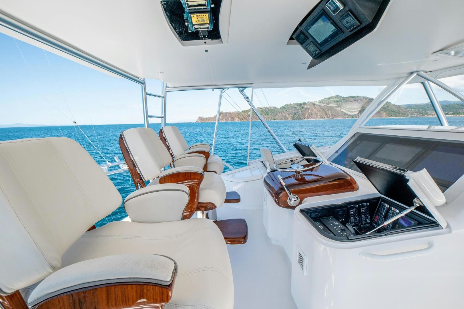 a boat with a white interior aboard RAGIN CAJUN Yacht for Sale