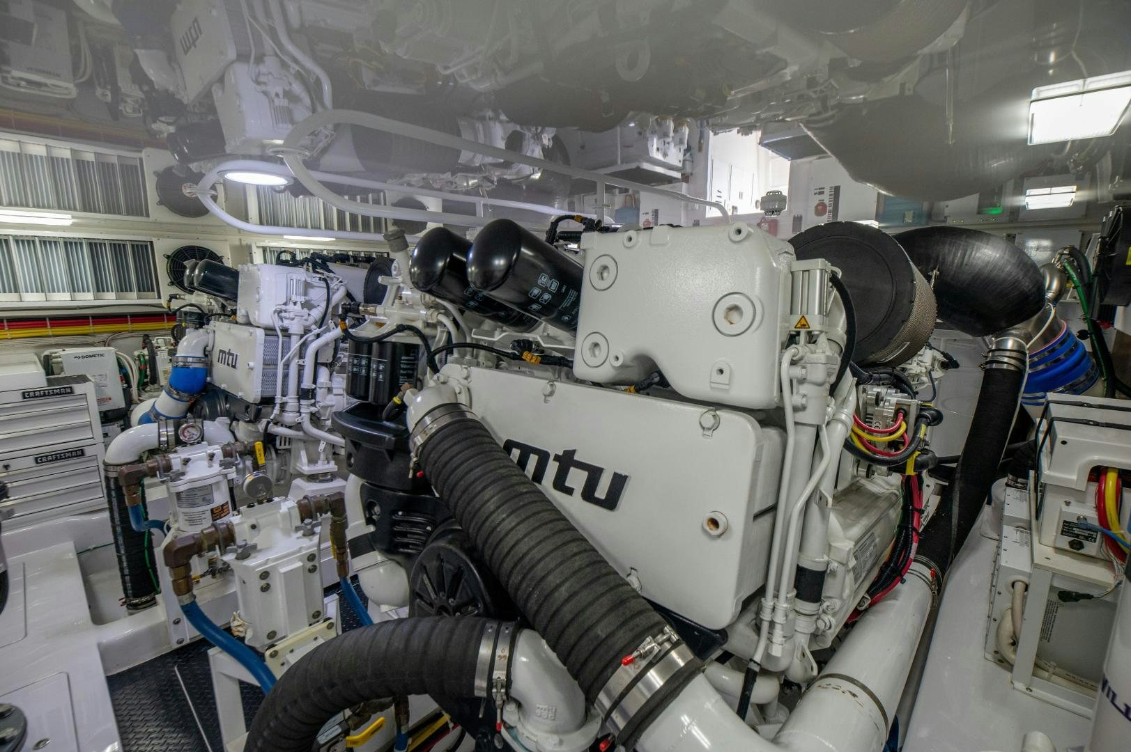 a robot in a room aboard RAGIN CAJUN Yacht for Sale