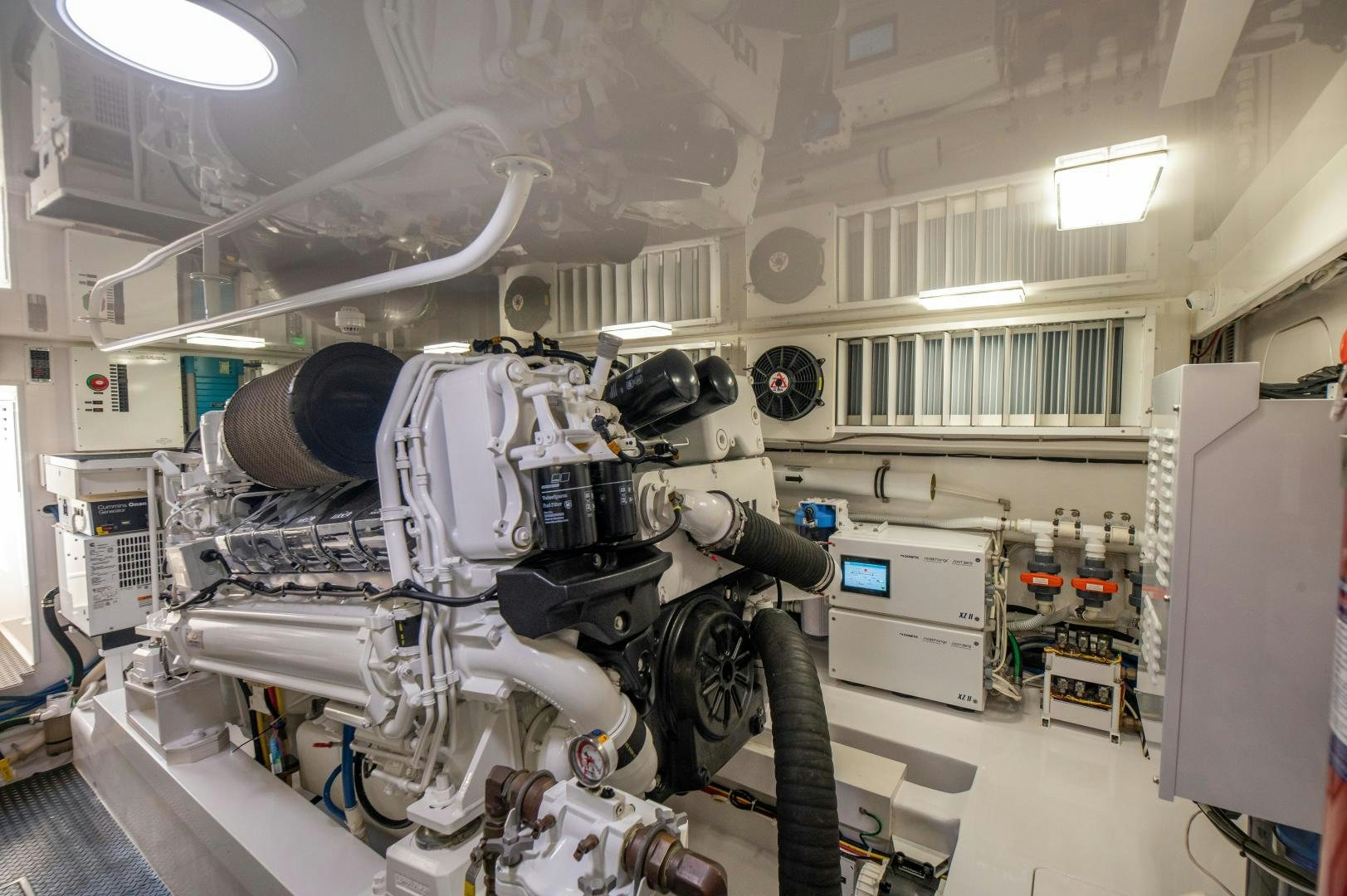 a room with machinery aboard RAGIN CAJUN Yacht for Sale