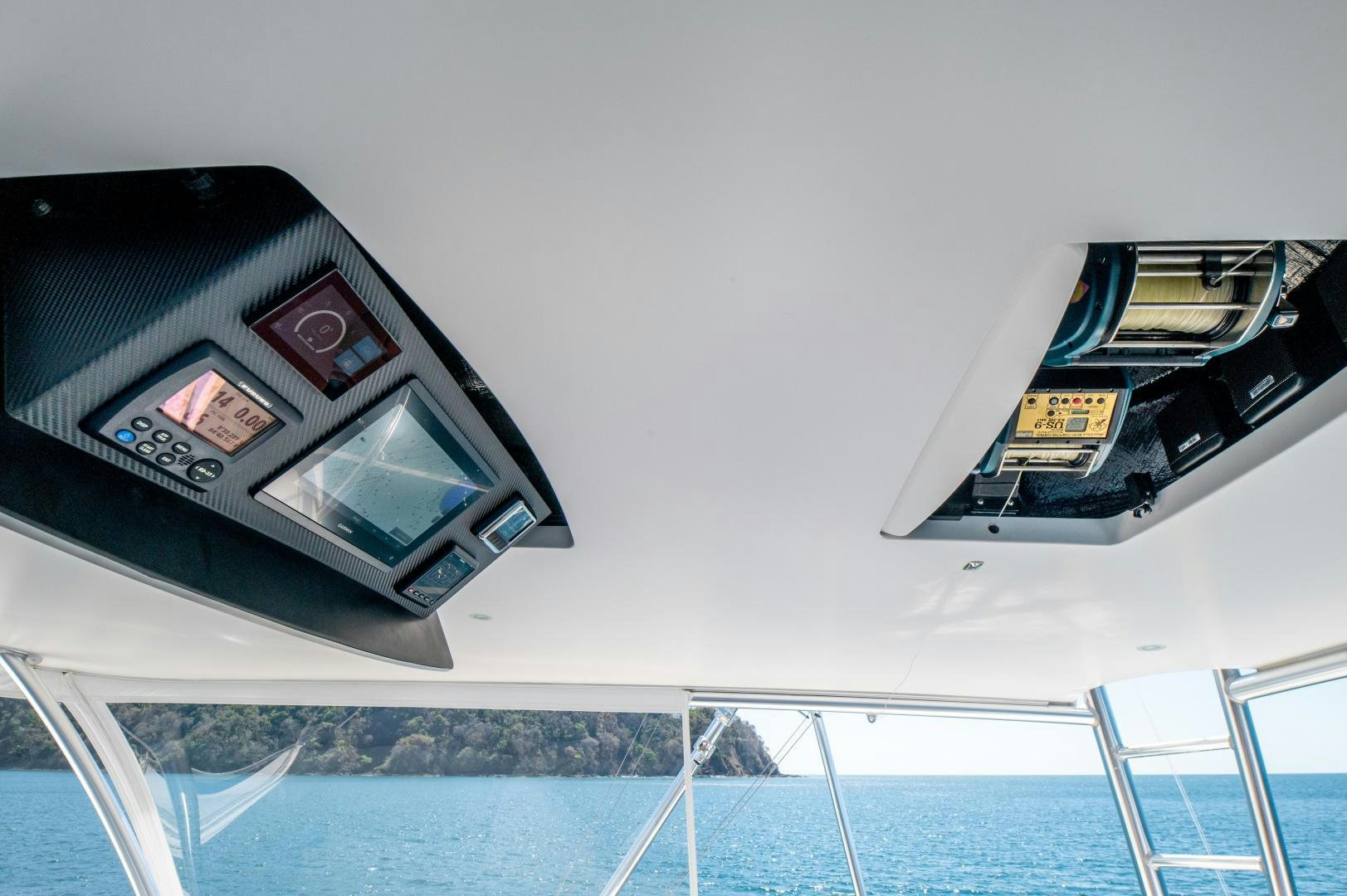 a group of rectangular electronic devices on a white surface aboard RAGIN CAJUN Yacht for Sale