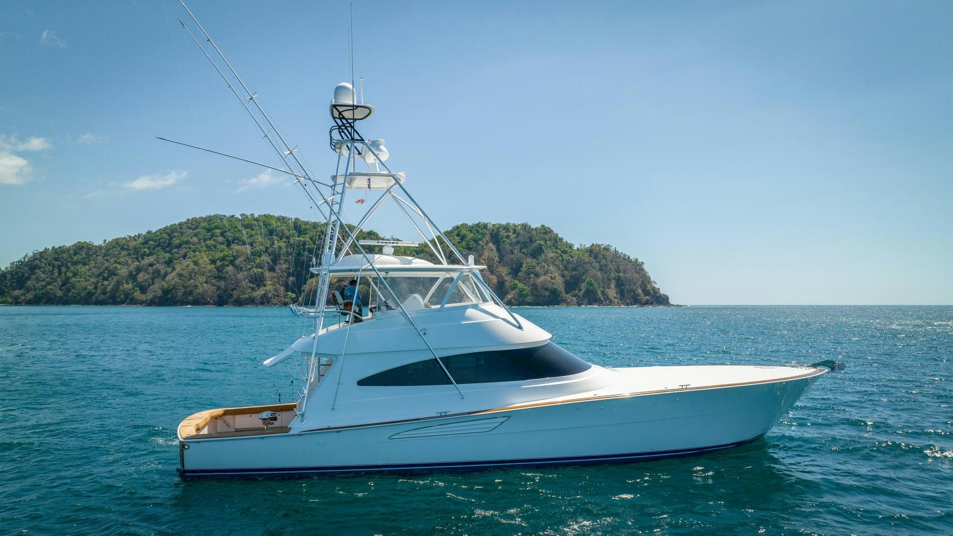 a boat in the water aboard RAGIN CAJUN Yacht for Sale