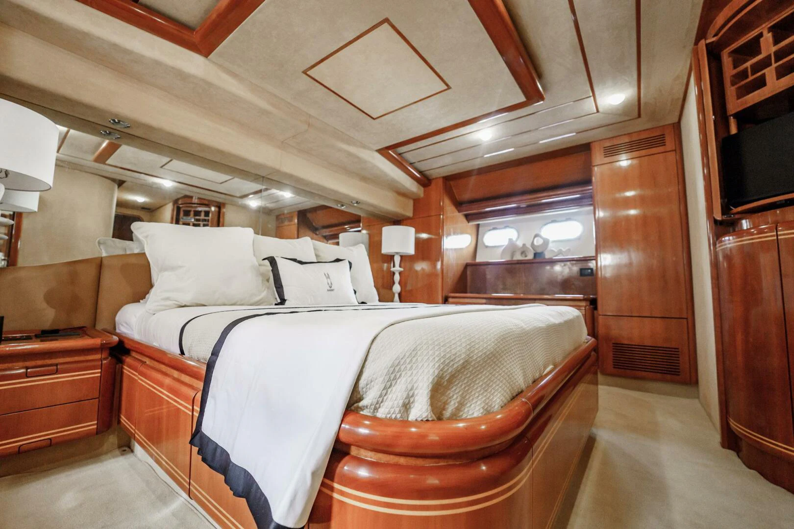 a room with a bed and a chair aboard RABBIT Yacht for Sale