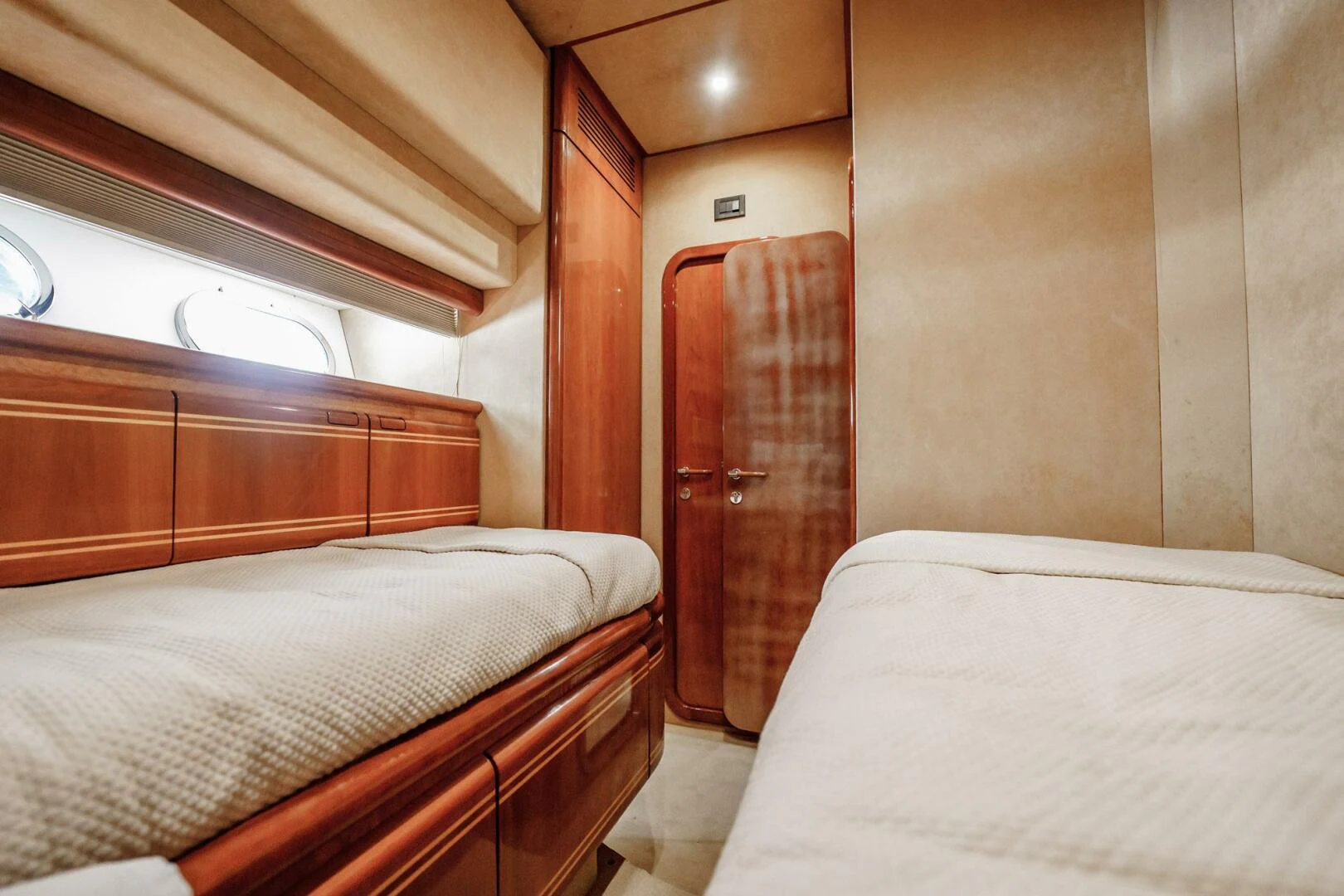 a couple of beds in a room aboard RABBIT Yacht for Sale