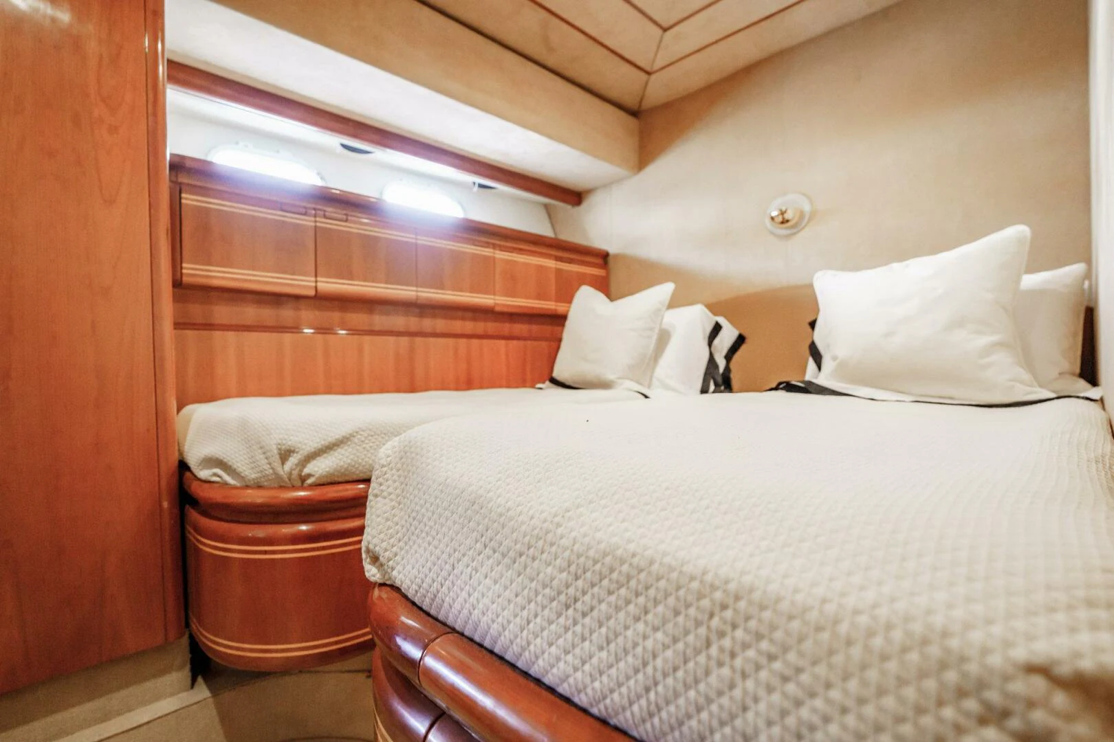 a couple of beds in a room aboard RABBIT Yacht for Sale