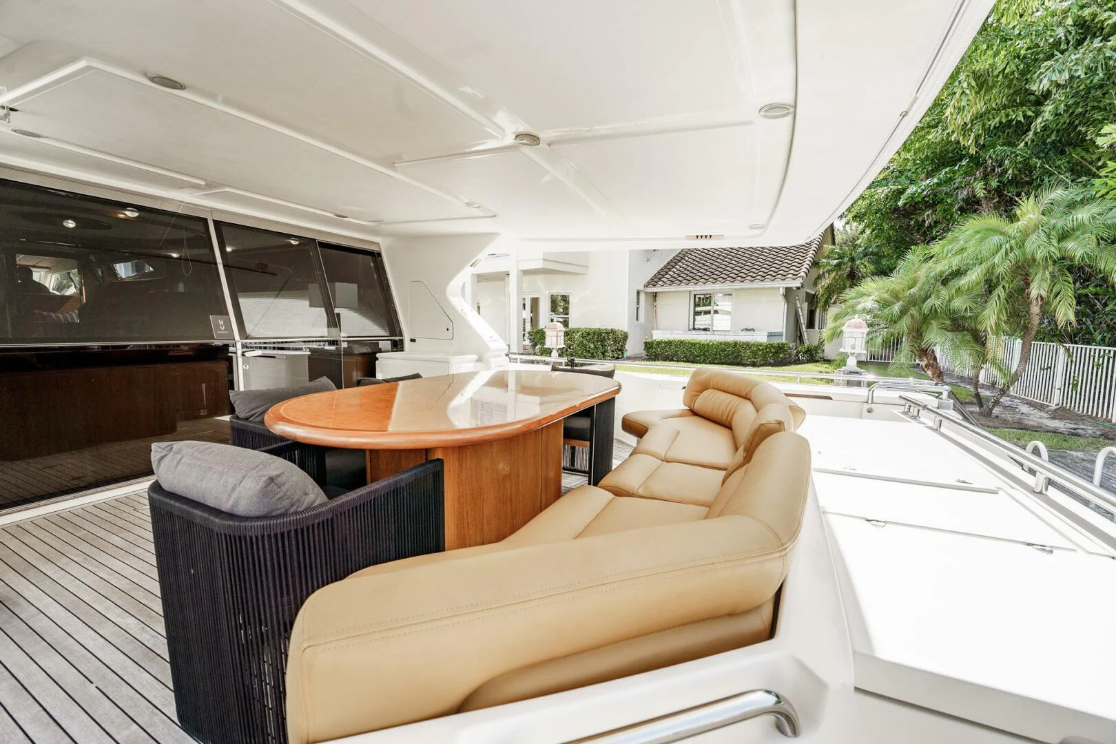 a table and chairs on a deck aboard RABBIT Yacht for Sale