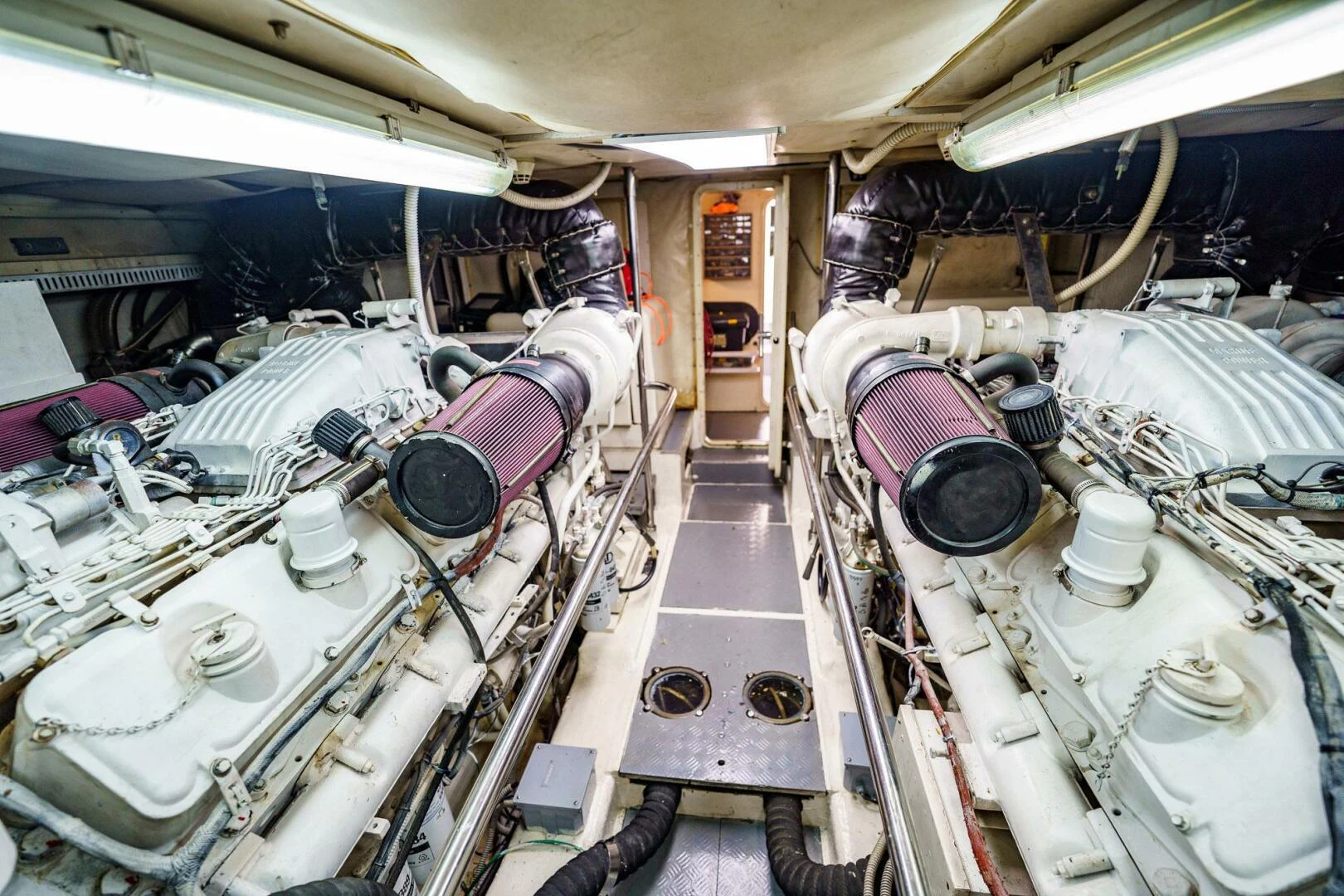 a room with many pipes and tubes aboard RABBIT Yacht for Sale