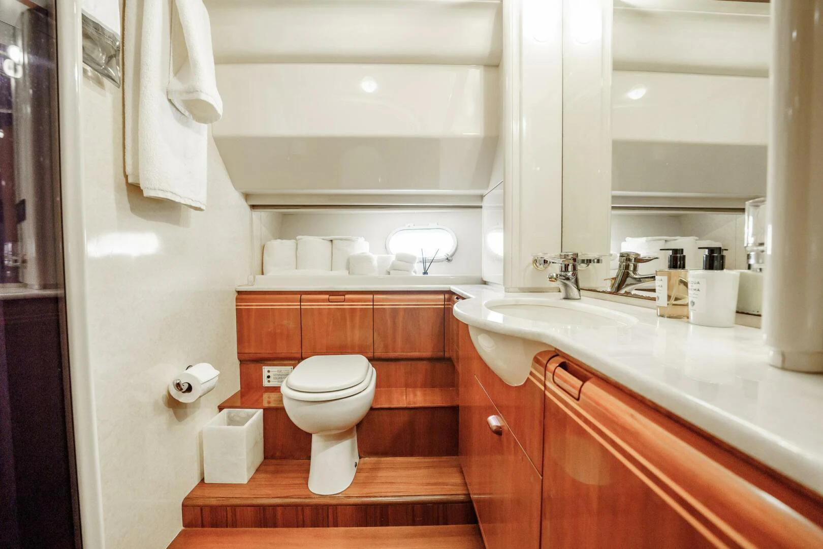 a bathroom with a toilet and a sink aboard RABBIT Yacht for Sale