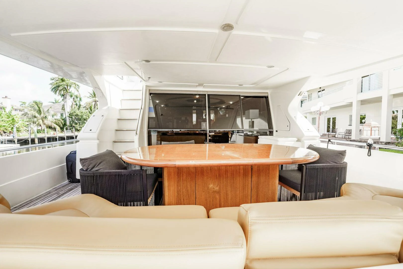 a living room with a table and chairs aboard RABBIT Yacht for Sale