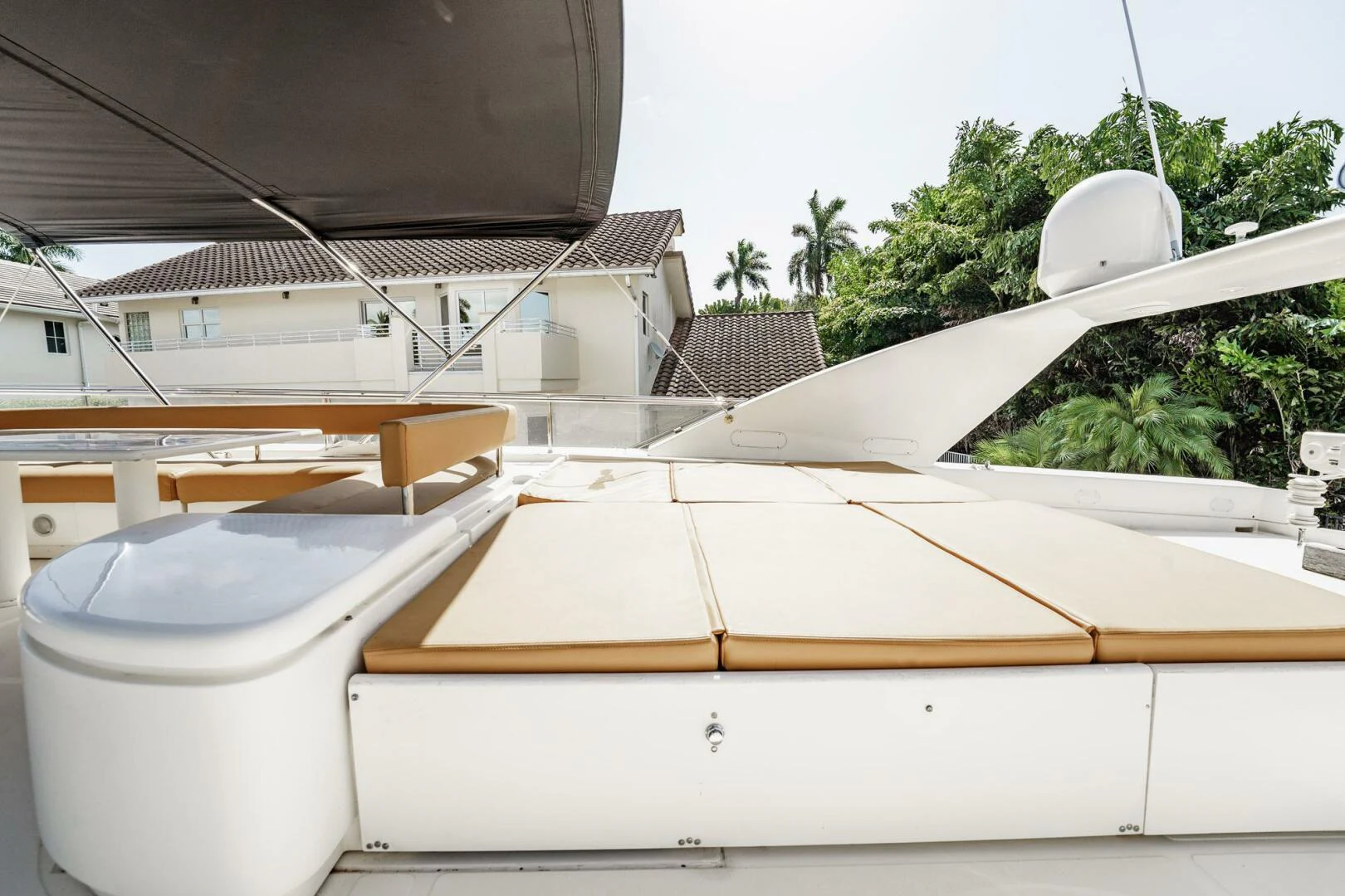 a rooftop with a few white rooftops and a large white building aboard RABBIT Yacht for Sale