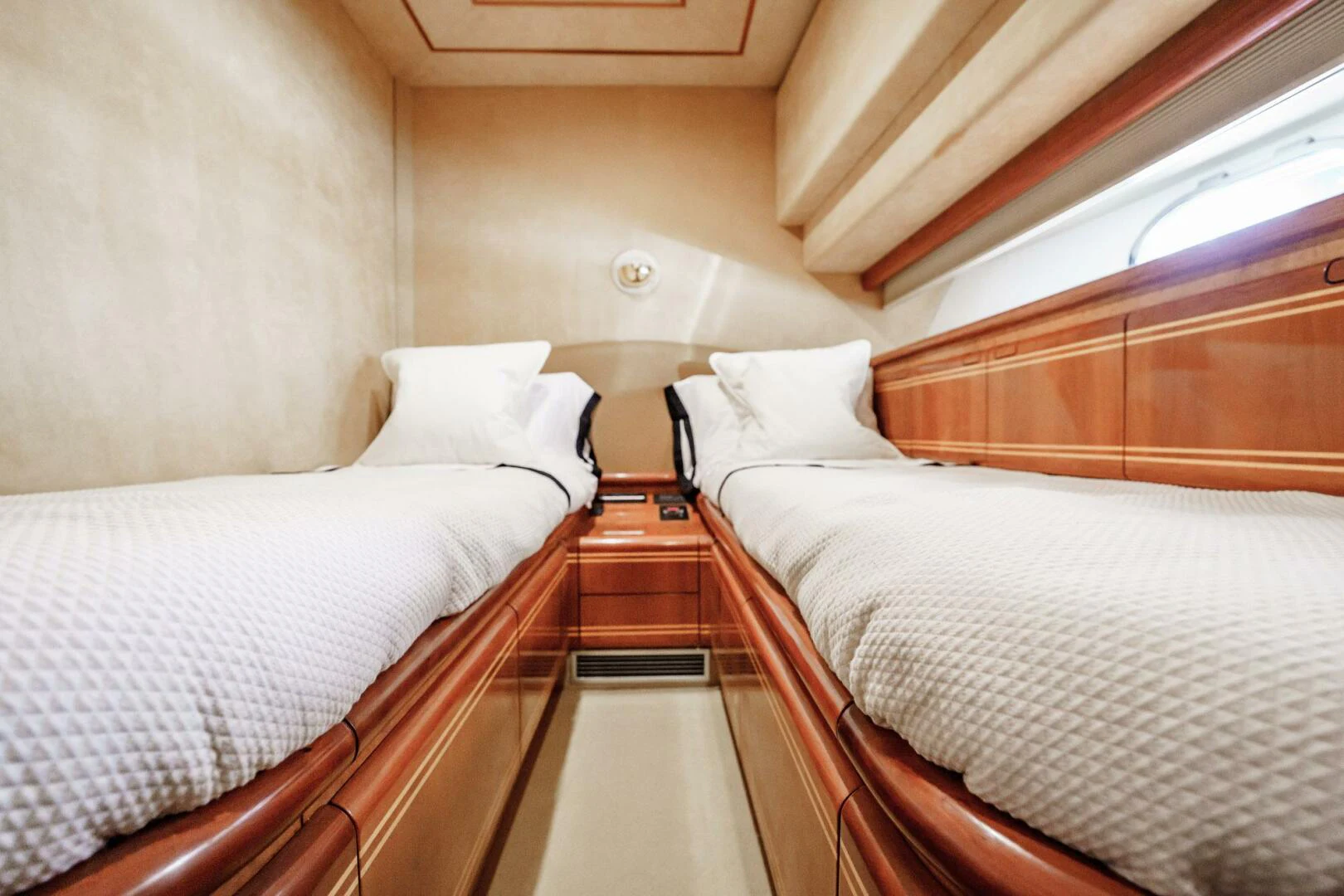 a couple of beds in a room aboard RABBIT Yacht for Sale