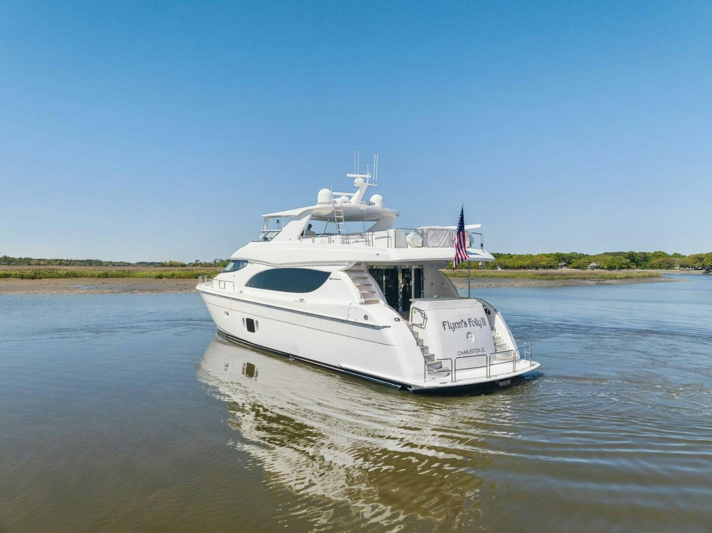 a boat on the water aboard FLYNN'S FOLLY III Yacht for Sale