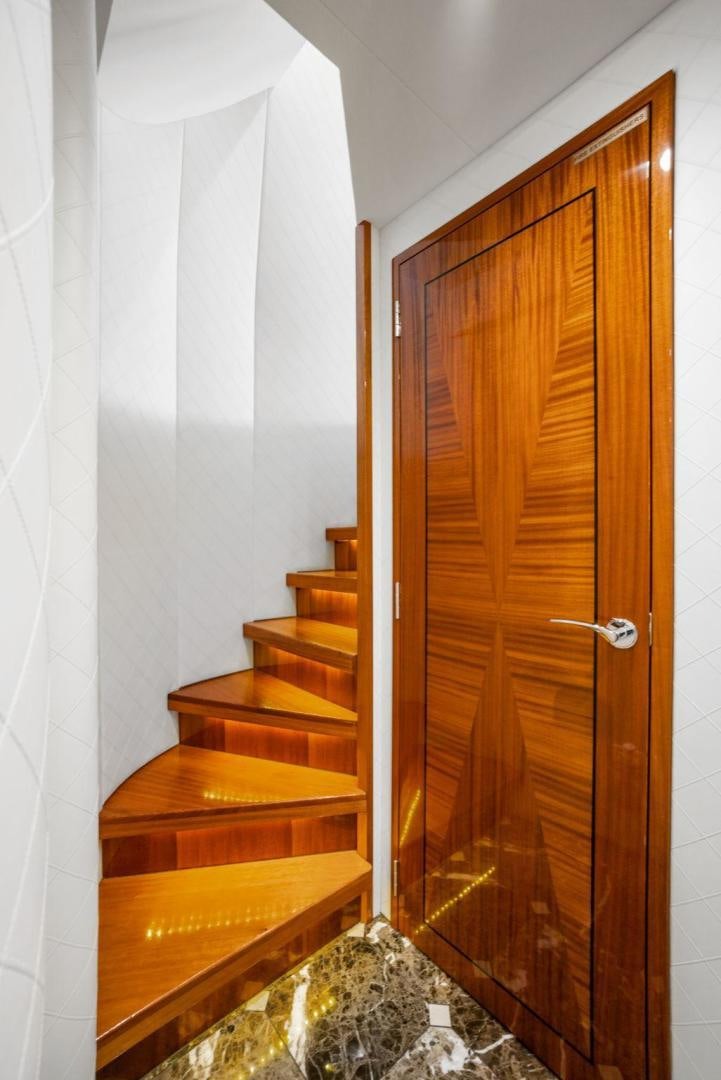 a wooden door leading to a room aboard FLYNN'S FOLLY III Yacht for Sale