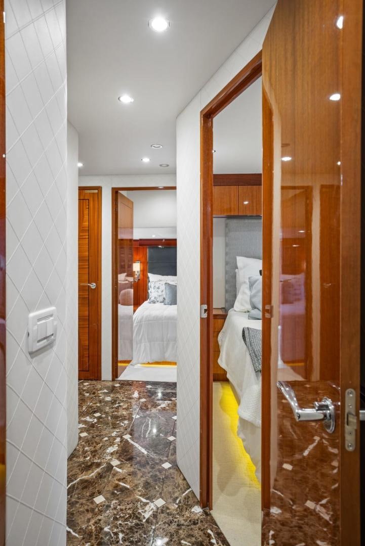 a bathroom with a glass shower aboard FLYNN'S FOLLY III Yacht for Sale