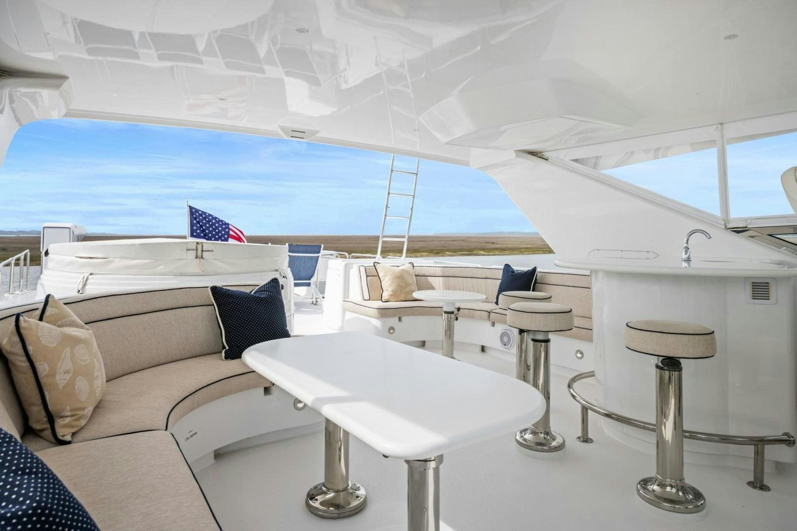 a room with a bed and a table aboard FLYNN'S FOLLY III Yacht for Sale