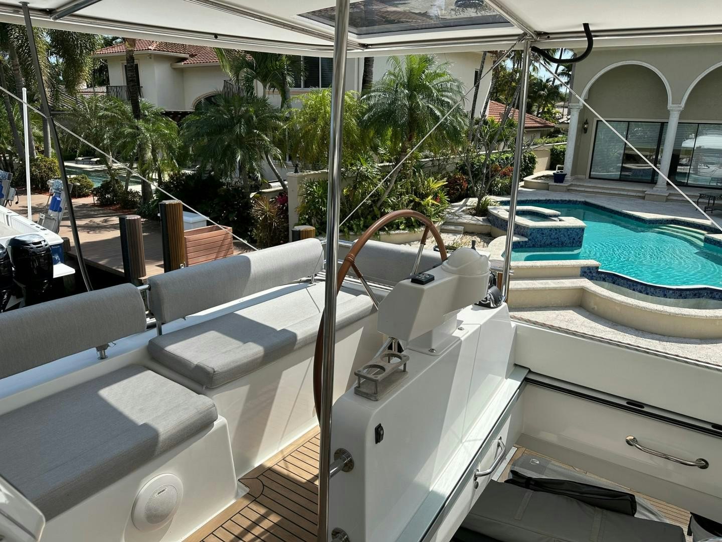 a boat with a steering wheel aboard OCEAN VIEW Yacht for Sale