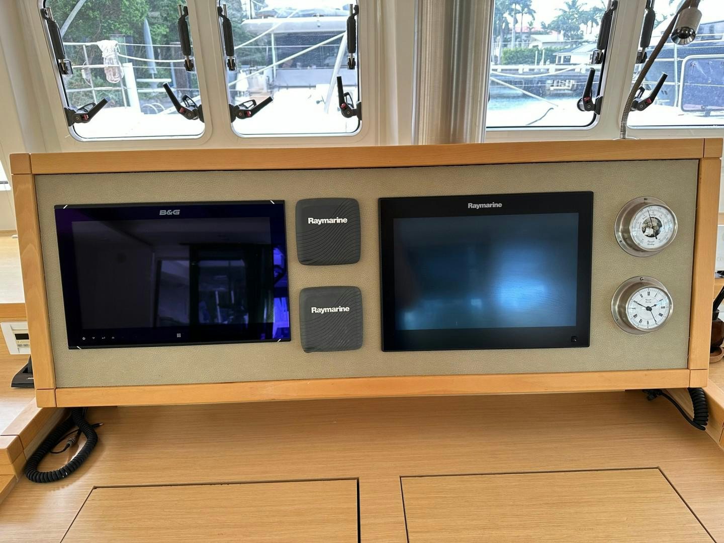 a couple of tvs on a shelf aboard OCEAN VIEW Yacht for Sale