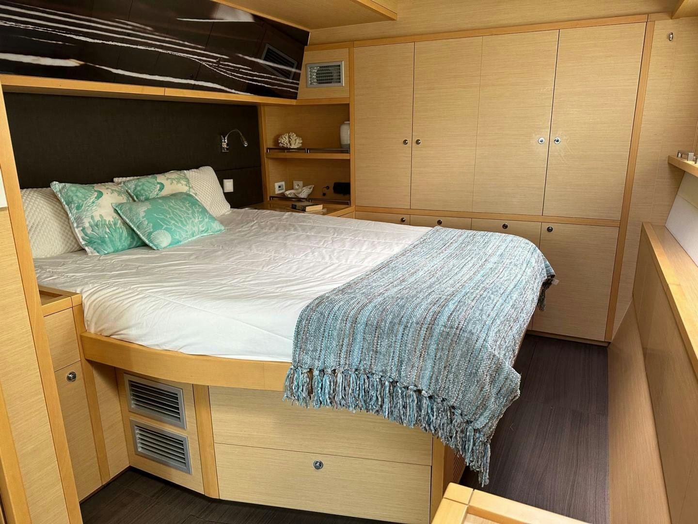 a bed in a room aboard OCEAN VIEW Yacht for Sale