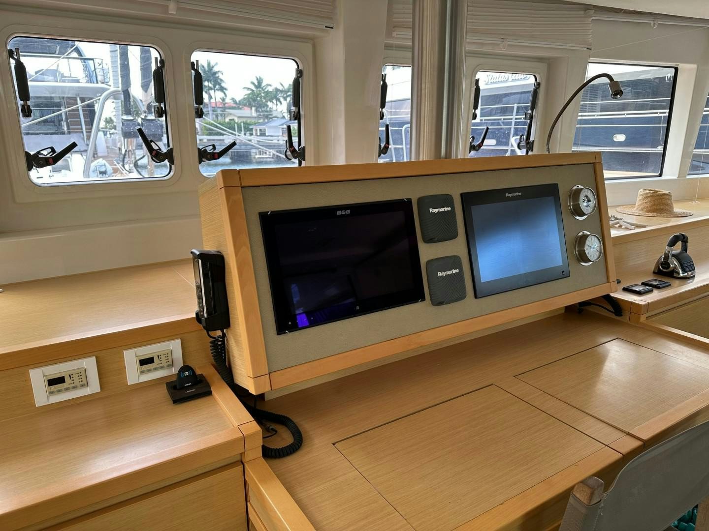 a couple of old computers on a desk aboard OCEAN VIEW Yacht for Sale