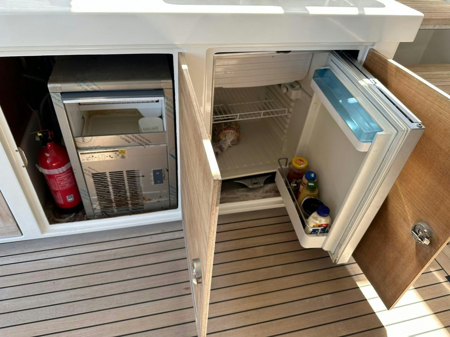 a refrigerator with its door open aboard OCEAN VIEW Yacht for Sale