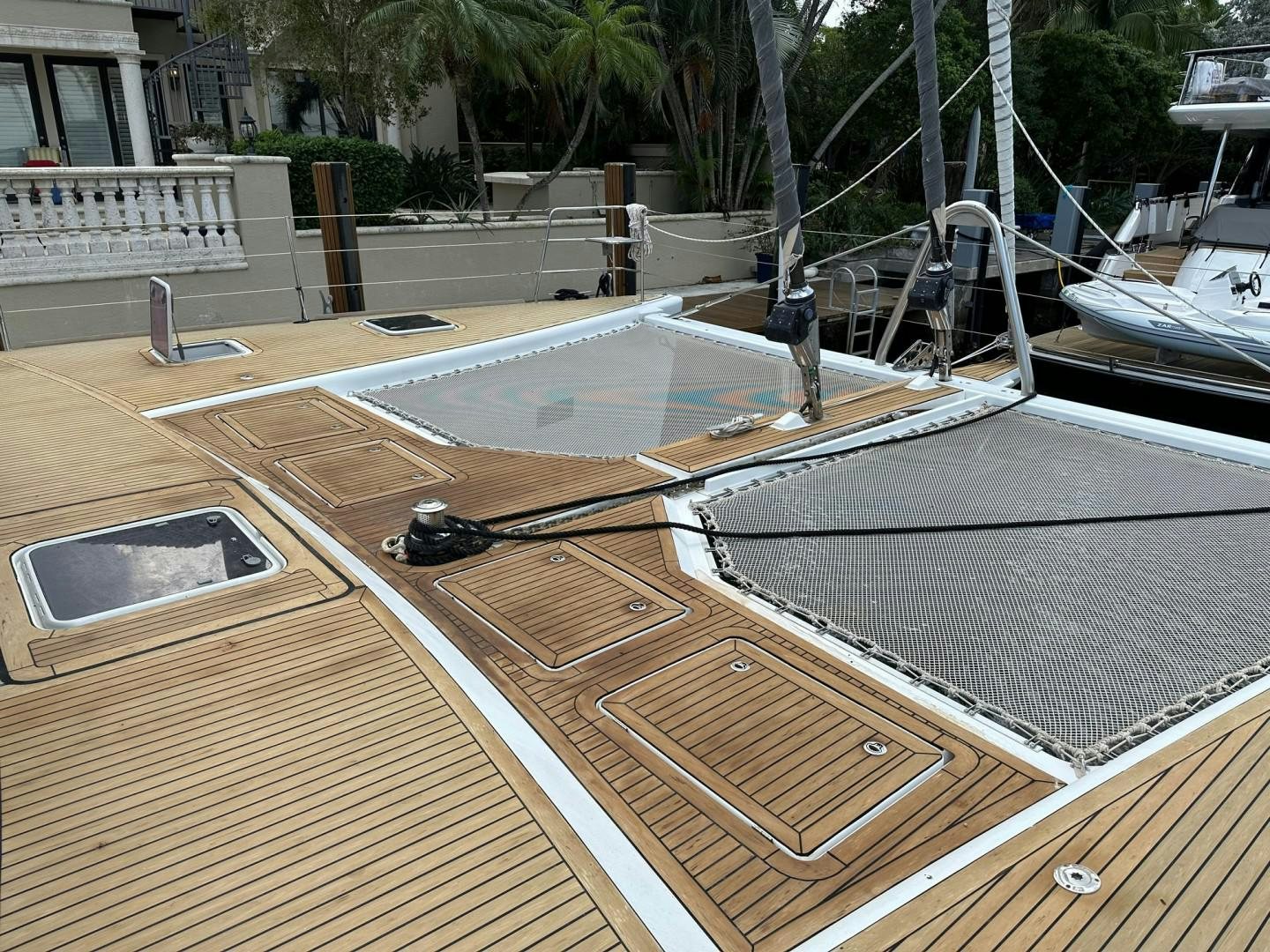 a deck with a trampoline and a pool aboard OCEAN VIEW Yacht for Sale